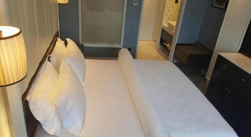 Bed in Jinjiang Metropolo Hotel Nanjing Confucius Temple Branch