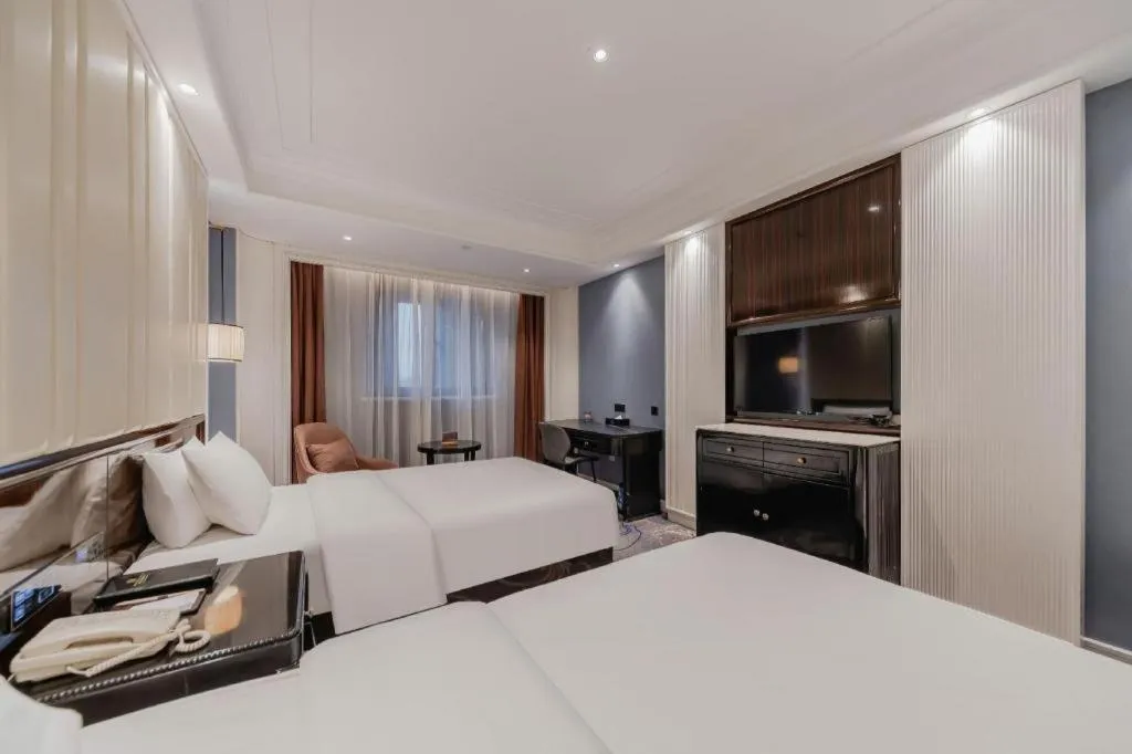 Bed in Jinjiang Metropolo Hotel Nanjing Confucius Temple Branch