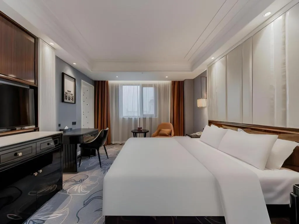 Bed in Jinjiang Metropolo Hotel Nanjing Confucius Temple Branch