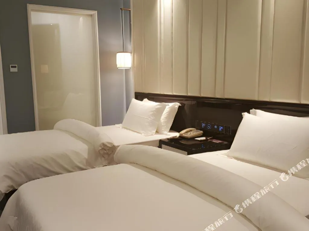 Bed in Jinjiang Metropolo Hotel Nanjing Confucius Temple Branch