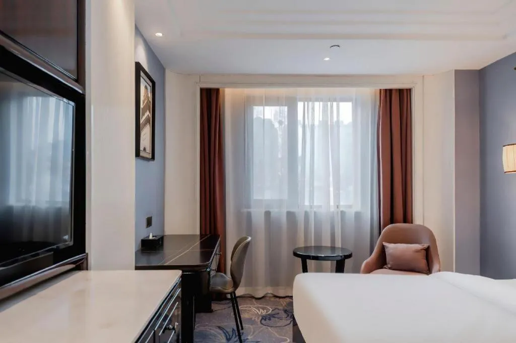 Bed in Jinjiang Metropolo Hotel Nanjing Confucius Temple Branch