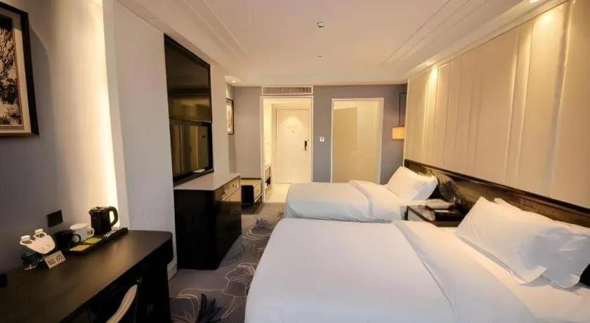 Bed in Jinjiang Metropolo Hotel Nanjing Confucius Temple Branch