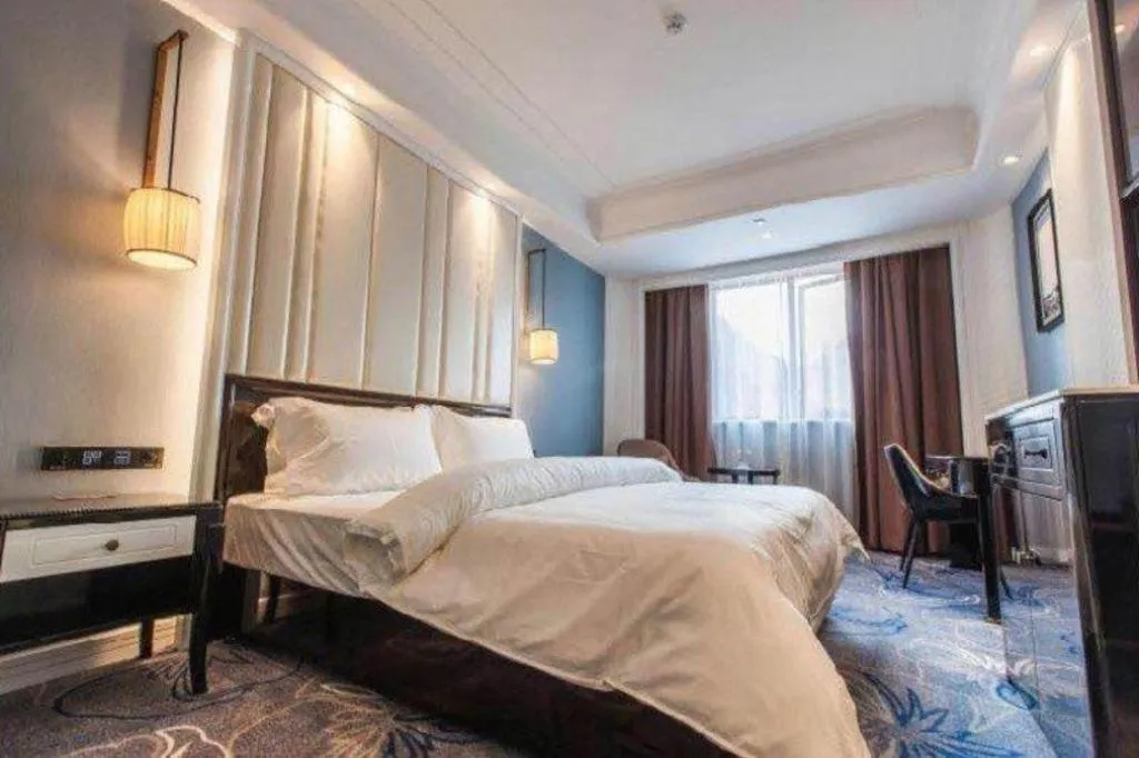 Bed in Jinjiang Metropolo Hotel Nanjing Confucius Temple Branch