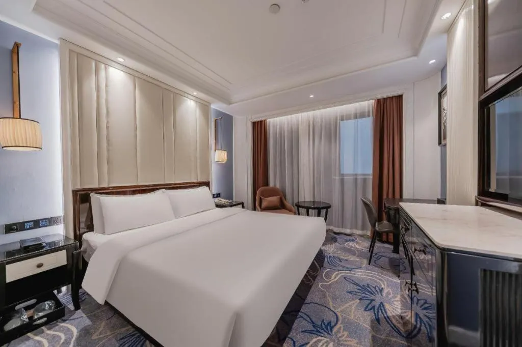 Bed in Jinjiang Metropolo Hotel Nanjing Confucius Temple Branch