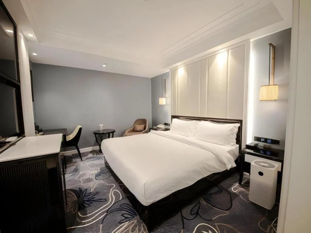 Bed in Jinjiang Metropolo Hotel Nanjing Confucius Temple Branch