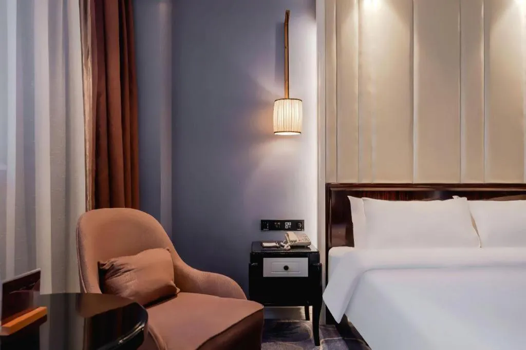 Bed in Jinjiang Metropolo Hotel Nanjing Confucius Temple Branch