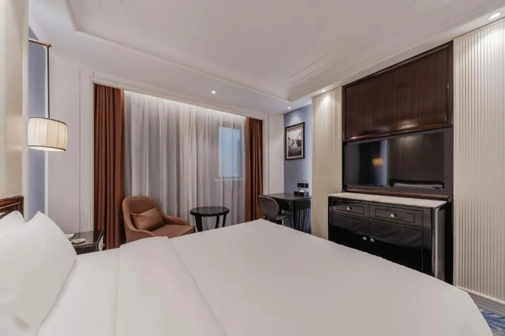 Bed in Jinjiang Metropolo Hotel Nanjing Confucius Temple Branch