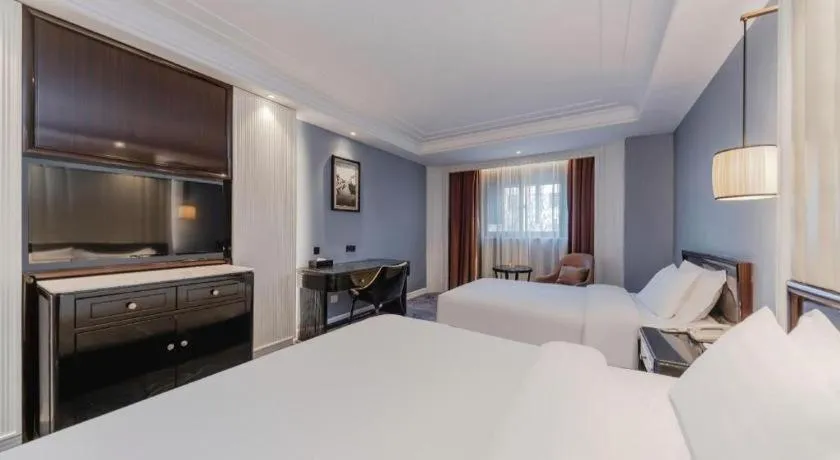 Bed in Jinjiang Metropolo Hotel Nanjing Confucius Temple Branch