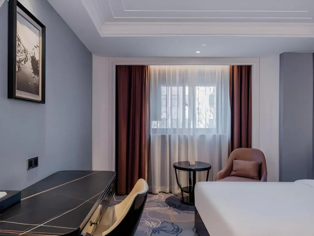 Bed in Jinjiang Metropolo Hotel Nanjing Confucius Temple Branch