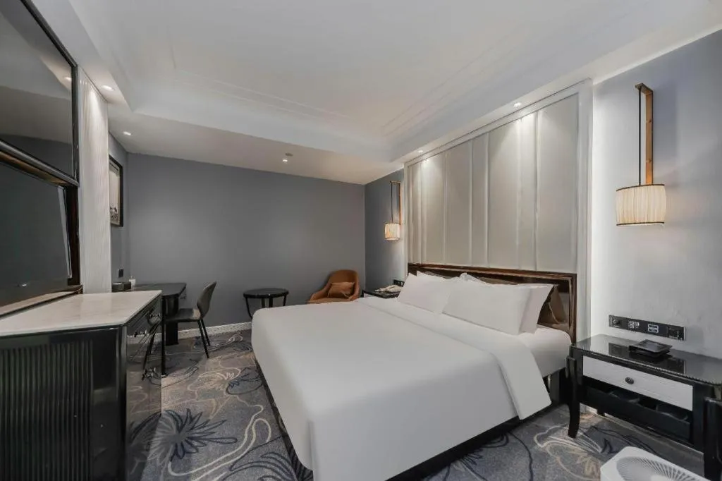 Bed in Jinjiang Metropolo Hotel Nanjing Confucius Temple Branch