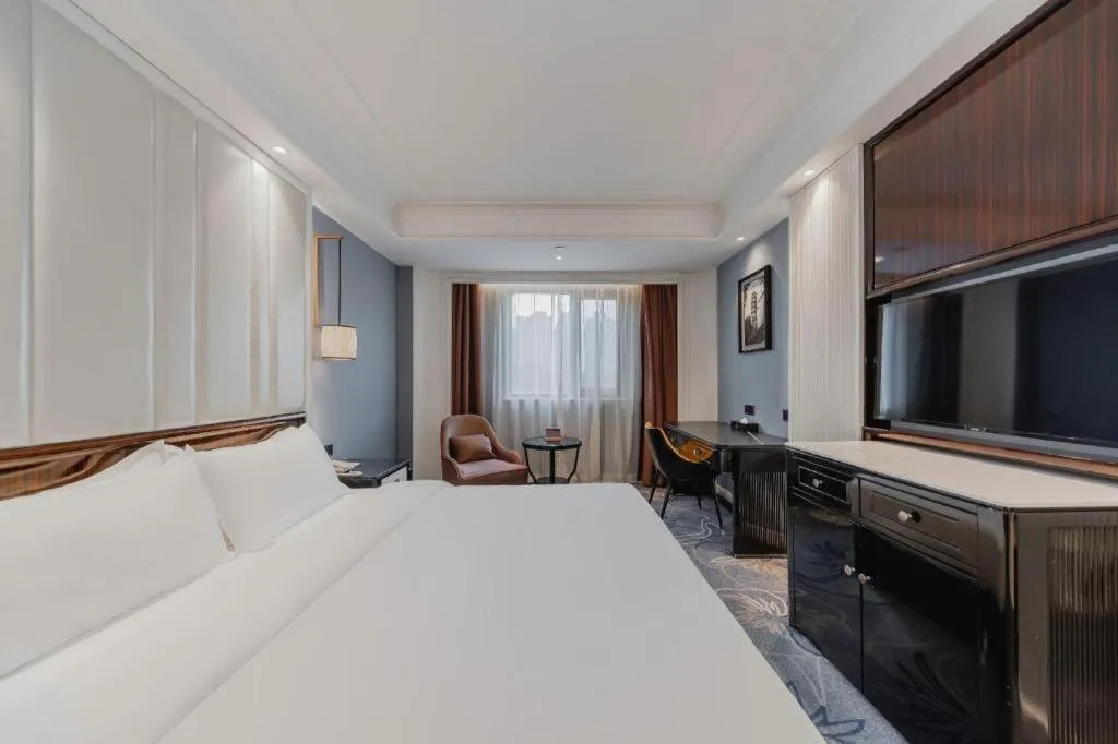 Bed in Jinjiang Metropolo Hotel Nanjing Confucius Temple Branch