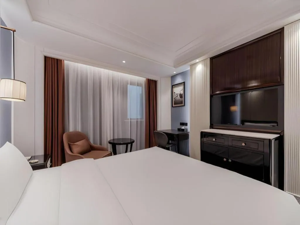 Bed in Jinjiang Metropolo Hotel Nanjing Confucius Temple Branch