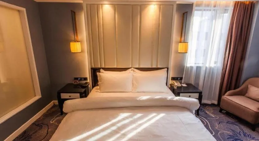 Bed in Jinjiang Metropolo Hotel Nanjing Confucius Temple Branch