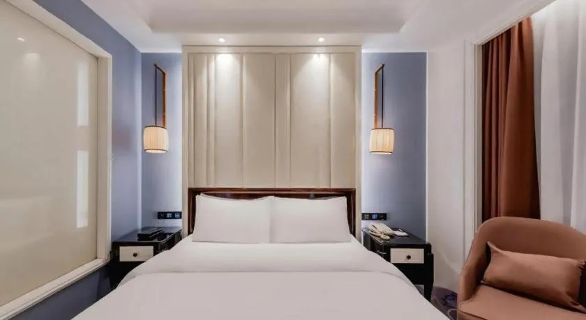 Bed in Jinjiang Metropolo Hotel Nanjing Confucius Temple Branch
