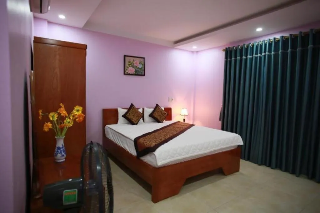 Bed in The Jade Dragon hotel