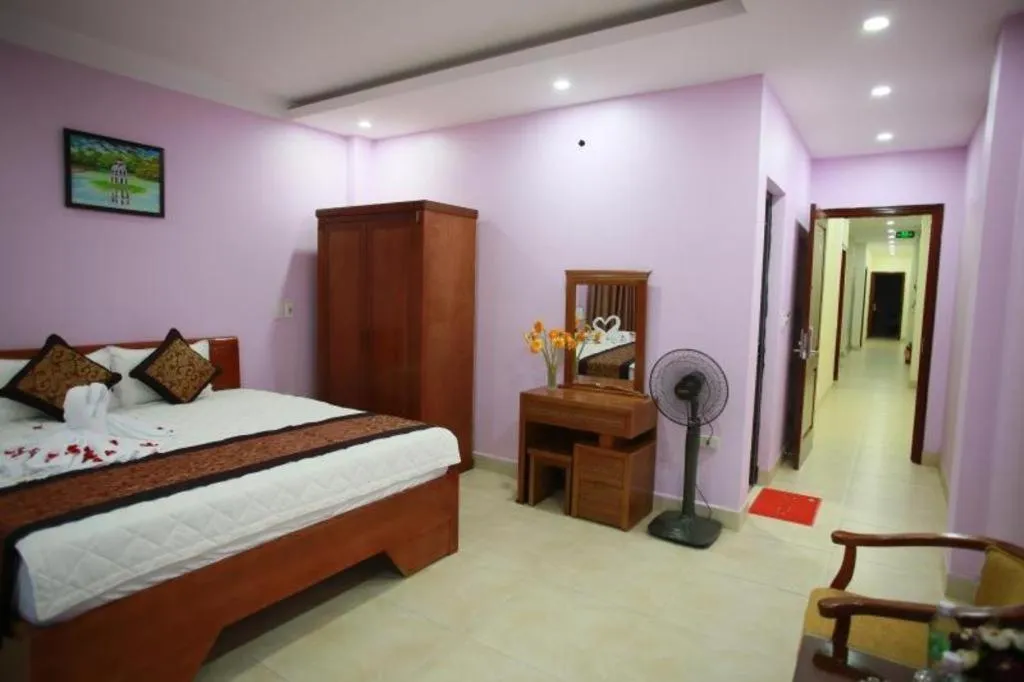 Bed in The Jade Dragon hotel