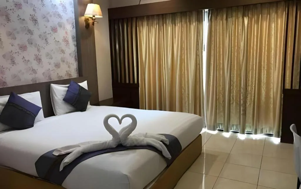 Bed in Phitsanulok Orchid Hotel