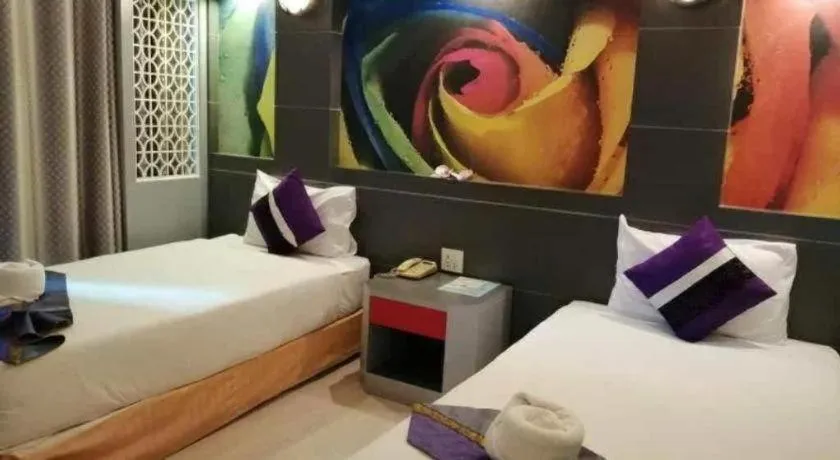 Bed in Phitsanulok Orchid Hotel