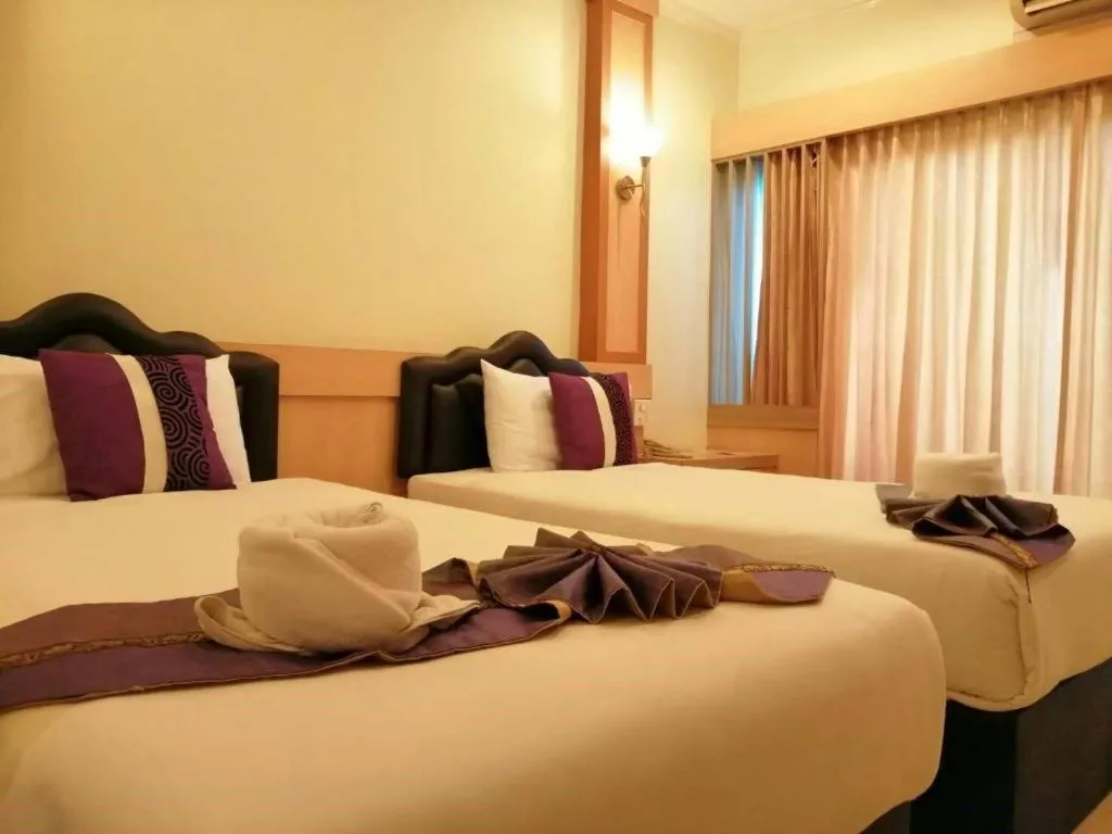 Bed in Phitsanulok Orchid Hotel