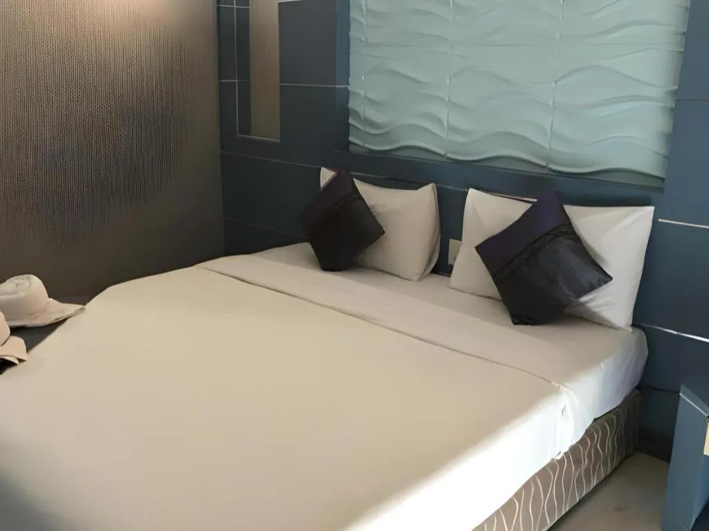 Bed in Phitsanulok Orchid Hotel