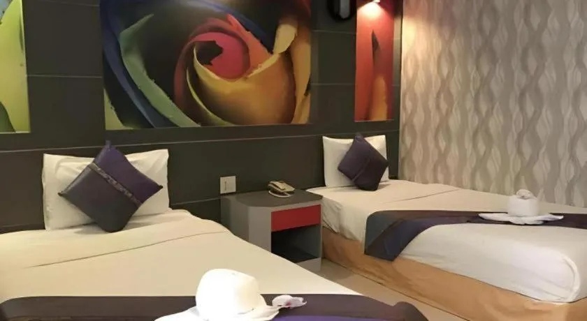 Bed in Phitsanulok Orchid Hotel