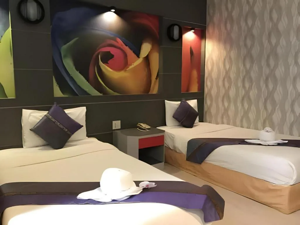 Bed in Phitsanulok Orchid Hotel