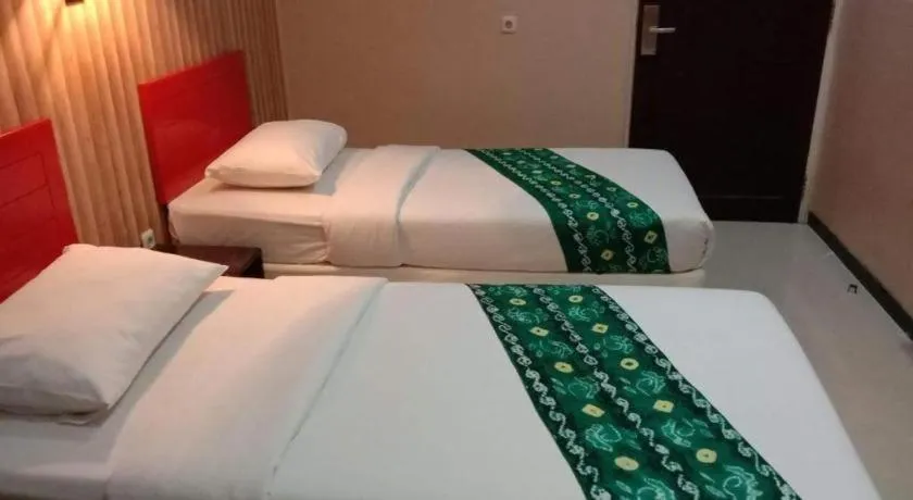 Bed in Queen City Hotel