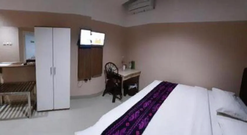 Bed in Queen City Hotel