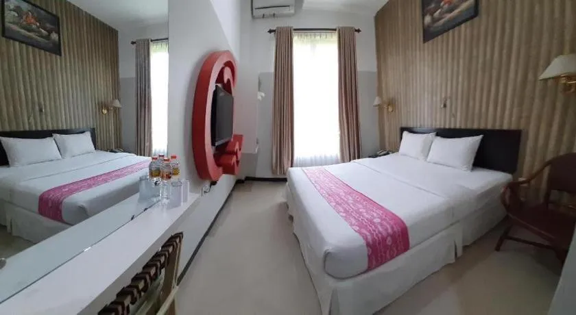 Bed in Queen City Hotel