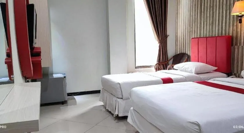 Bed in Queen City Hotel