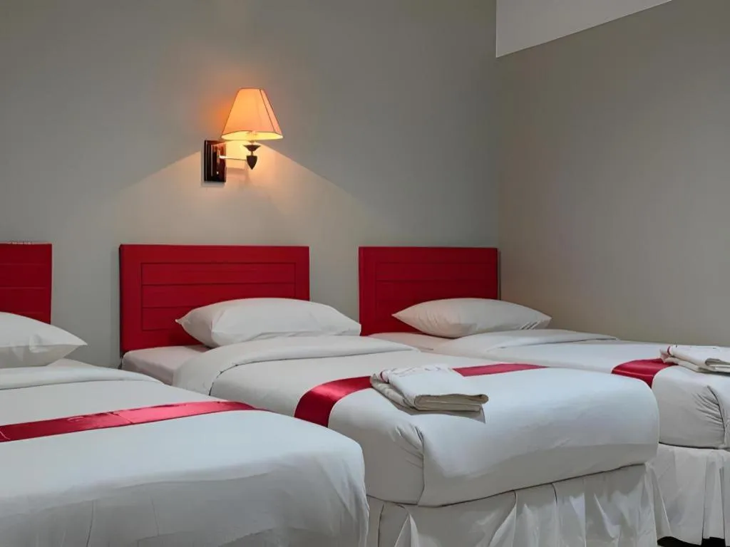 Bed in Queen City Hotel