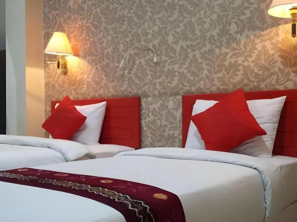 Bed in Queen City Hotel