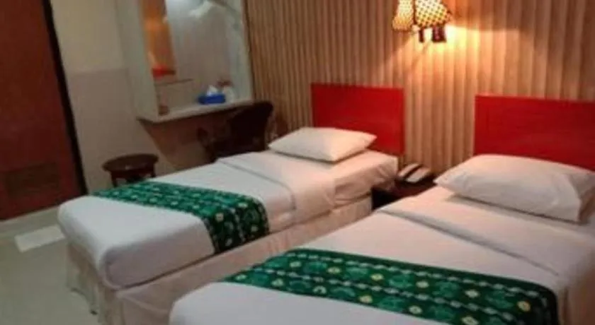Bed in Queen City Hotel