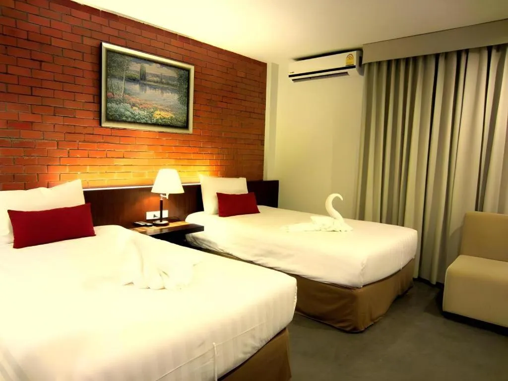 Bed in De Aerng Boutique Hotel