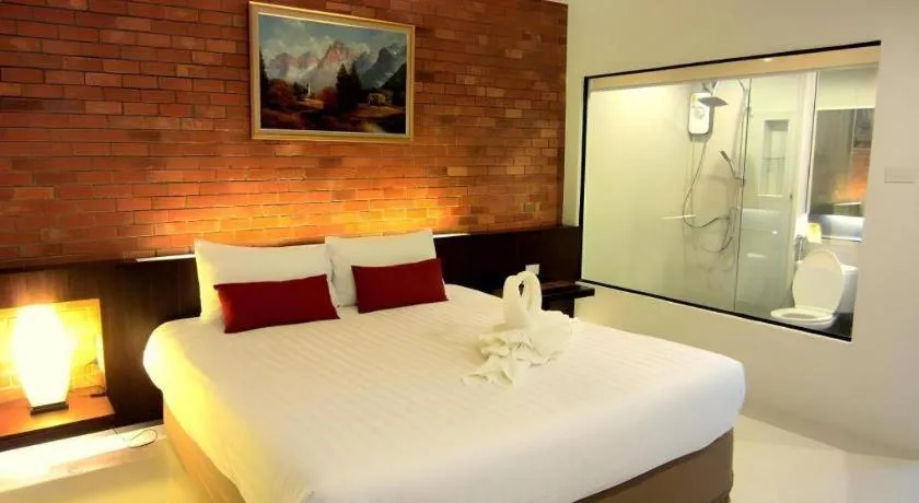 Bed in De Aerng Boutique Hotel