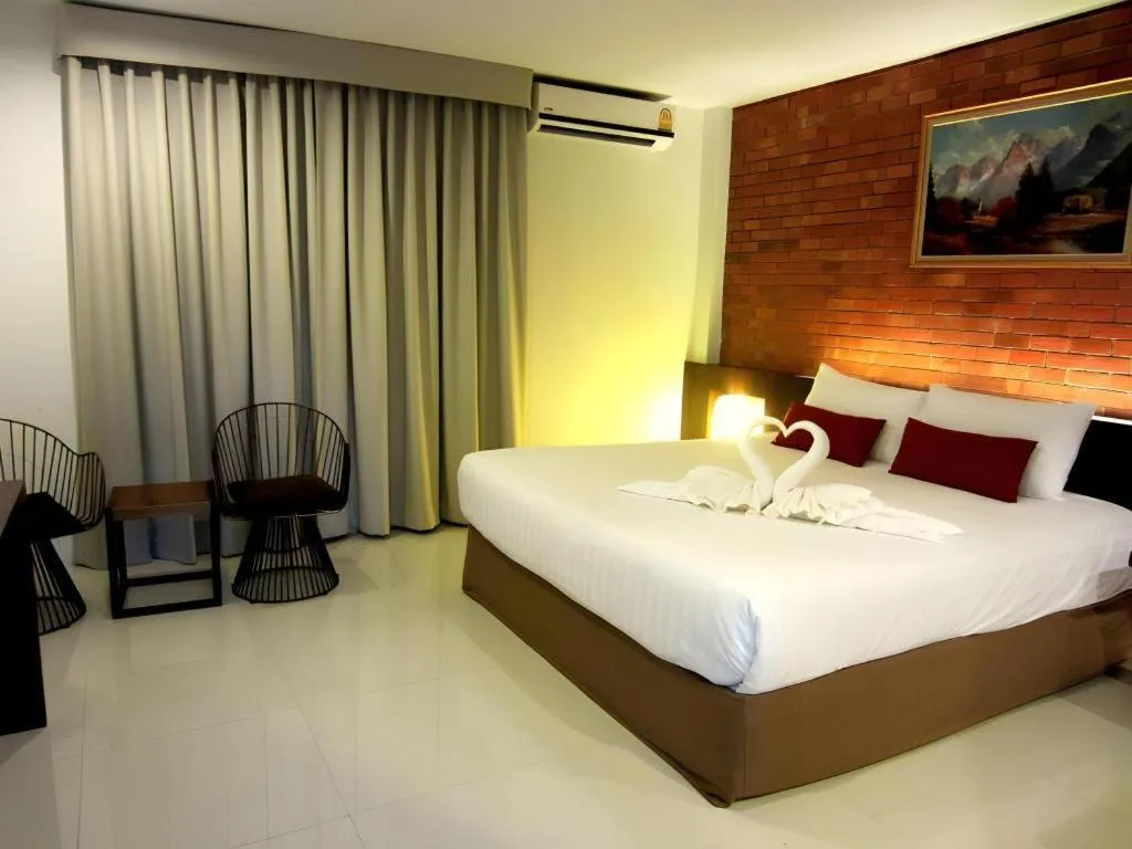 Bed in De Aerng Boutique Hotel
