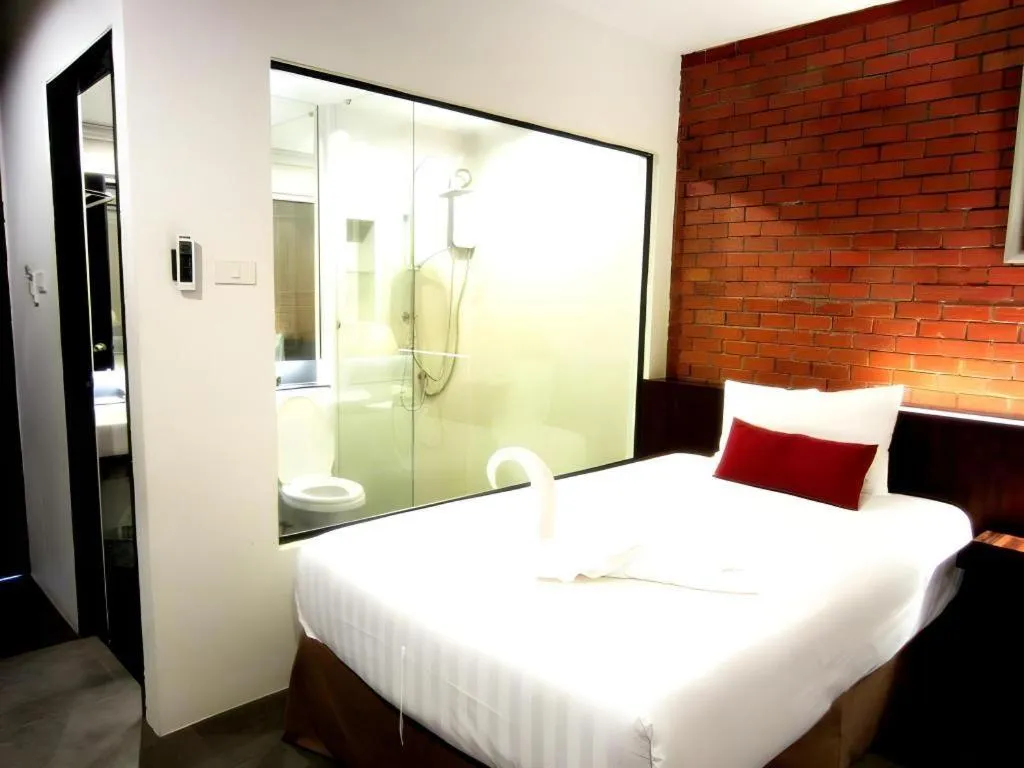 Bed in De Aerng Boutique Hotel
