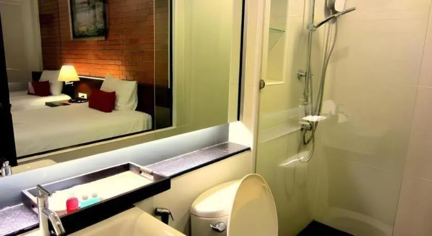 Bed in De Aerng Boutique Hotel