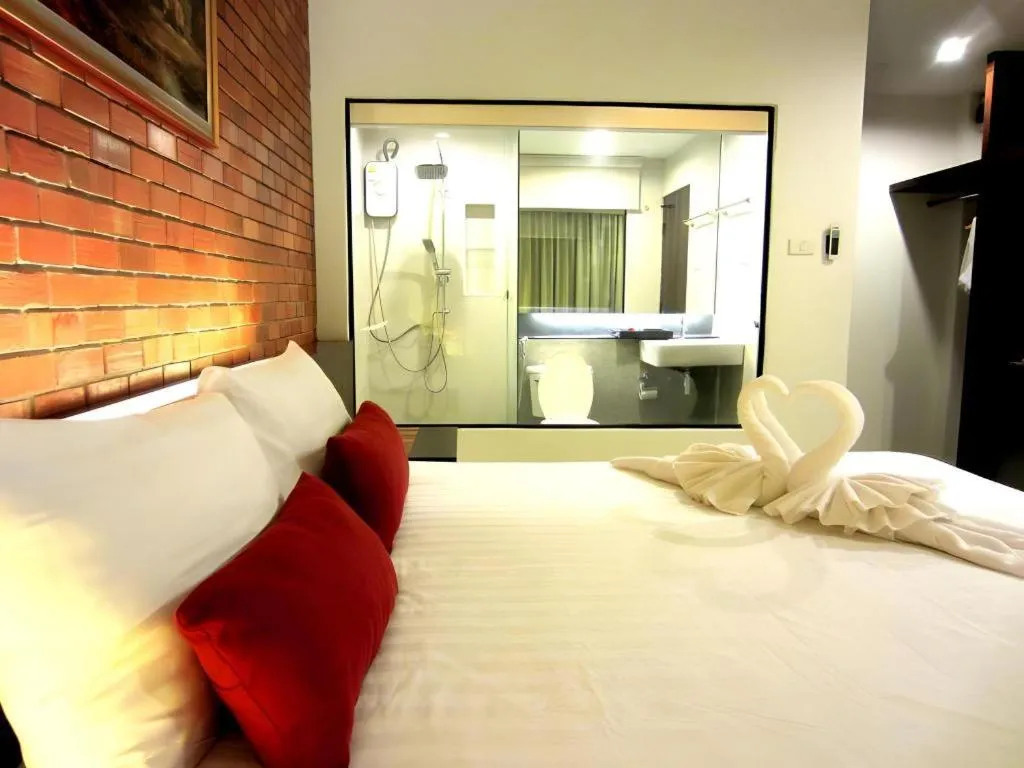 Bed in De Aerng Boutique Hotel