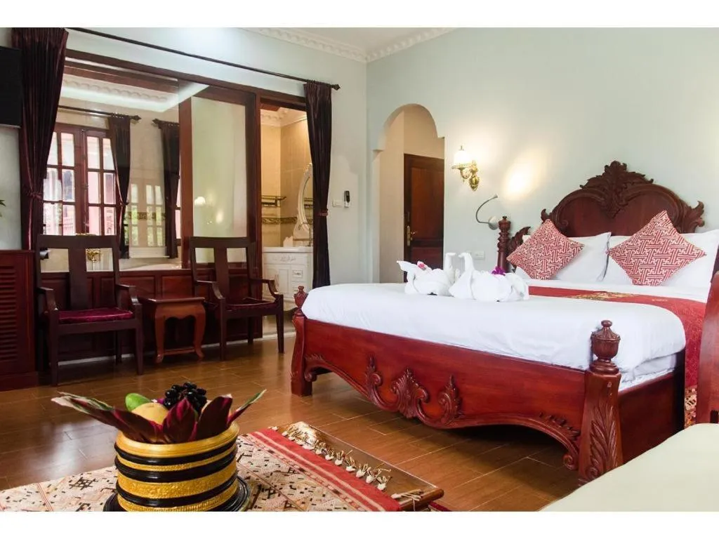 Bed in The View Pavilion Hotel