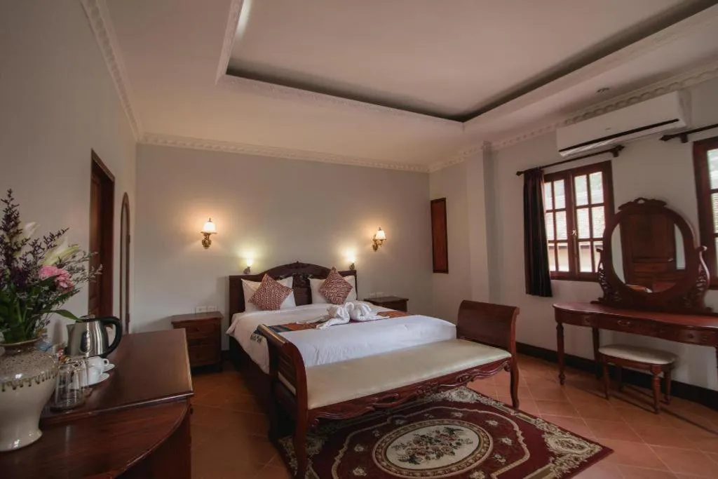 Bed in The View Pavilion Hotel