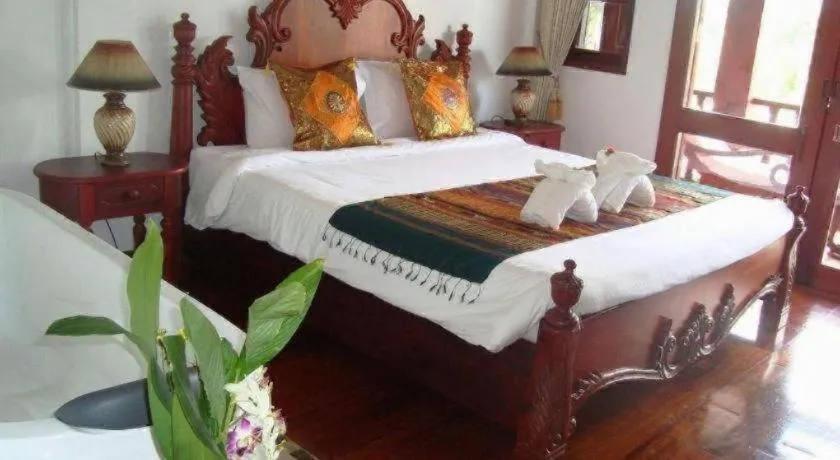 Bed in The View Pavilion Hotel