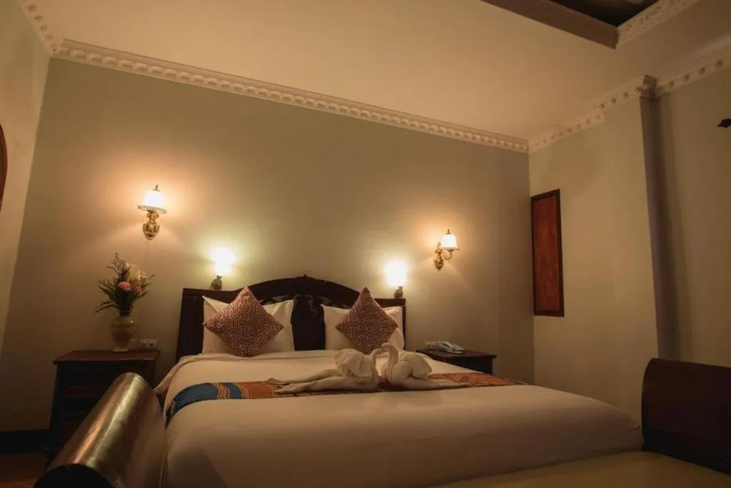 Bed in The View Pavilion Hotel