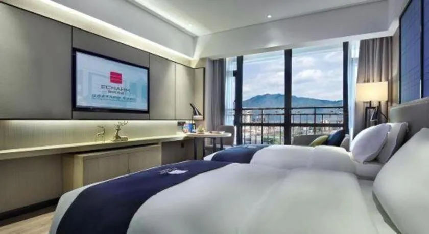 Bed in Echarm Hotel Guilin North High Speed Railway Station