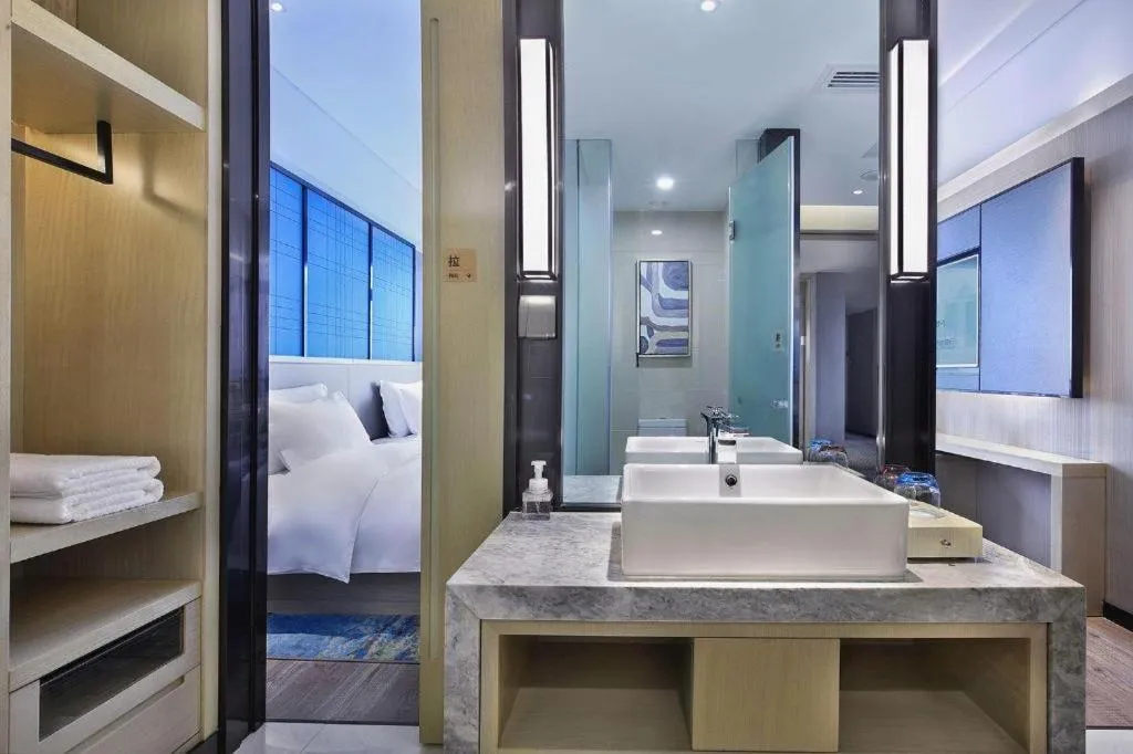 Bed in Echarm Hotel Guilin North High Speed Railway Station