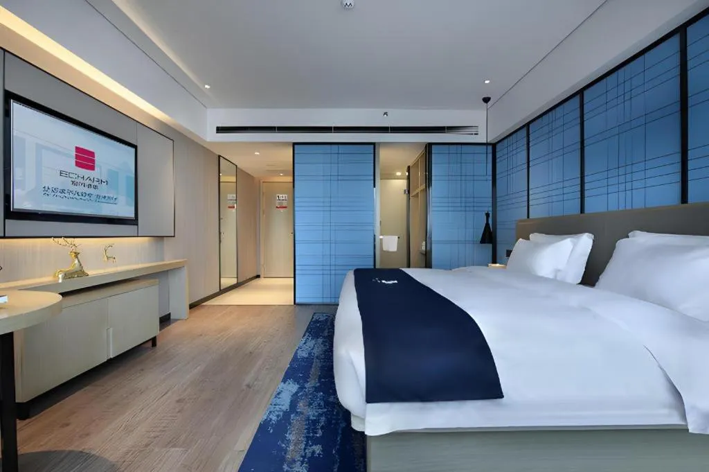 Bed in Echarm Hotel Guilin North High Speed Railway Station