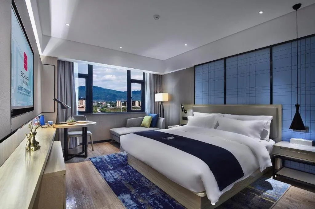 Bed in Echarm Hotel Guilin North High Speed Railway Station