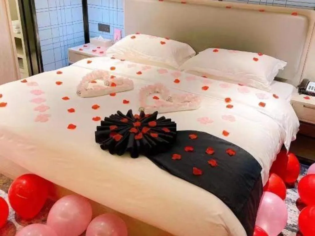 Bed in Echarm Hotel Guilin North High Speed Railway Station