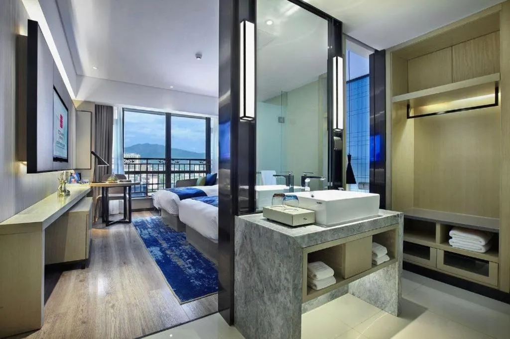 Bed in Echarm Hotel Guilin North High Speed Railway Station