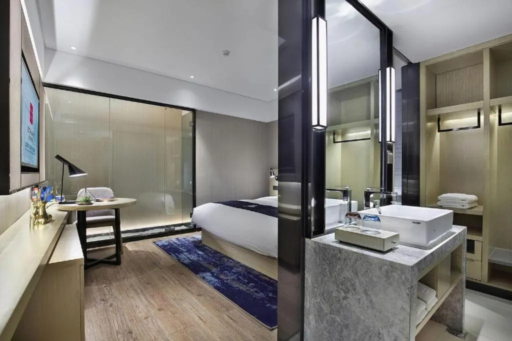 Bed in Echarm Hotel Guilin North High Speed Railway Station